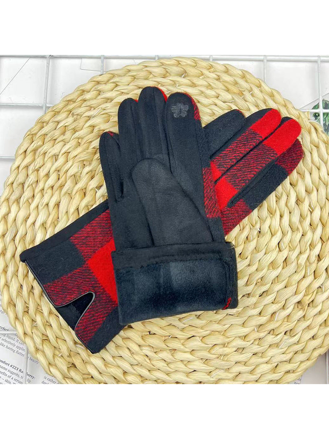 Red and black plaid gloves showing the black palms and plush-textured cuffs