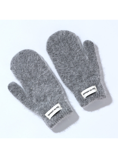 Dark gray fuzzy mittens with ribbed cuffs, pair view