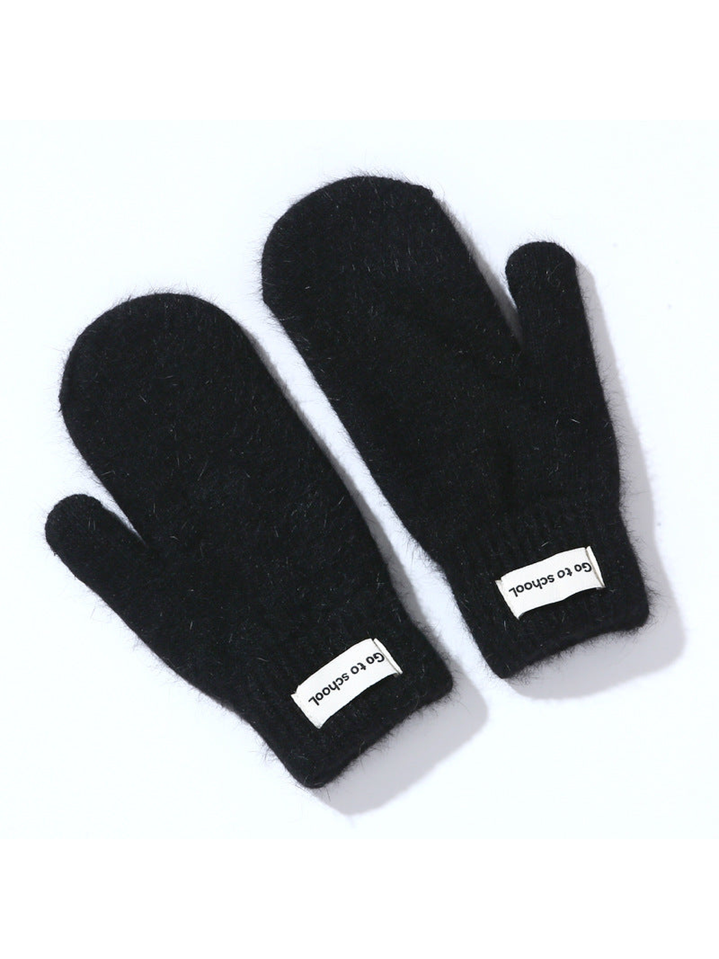 Black fuzzy mittens with ribbed cuffs, pair view