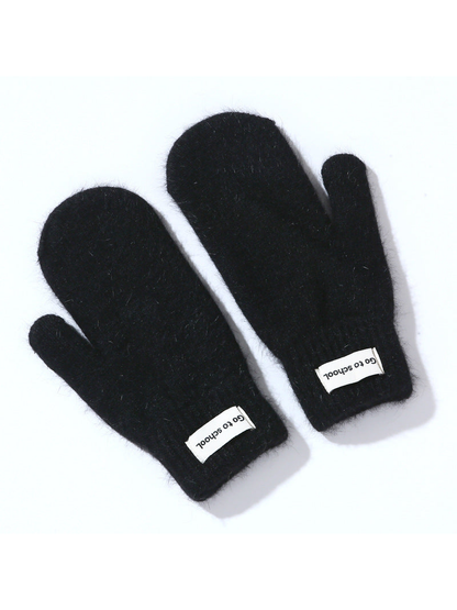 Black fuzzy mittens with ribbed cuffs, pair view