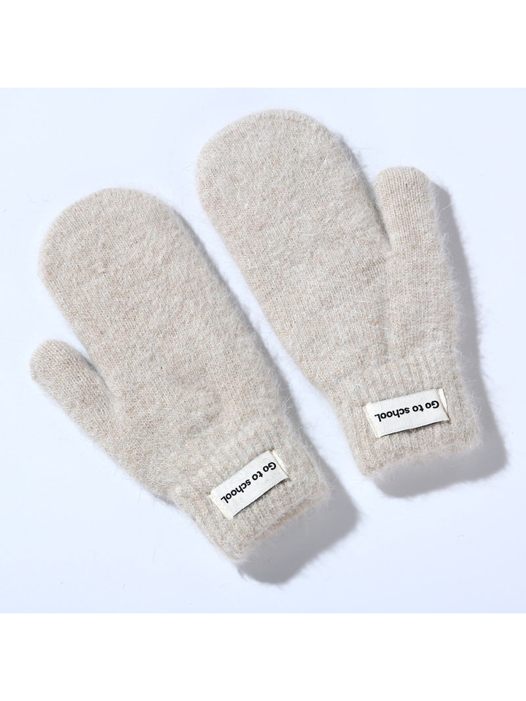 Beige fuzzy mittens with ribbed cuffs, pair view