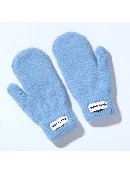 Light blue fuzzy mittens with ribbed cuffs, pair view