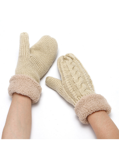 Beige cable-knit mittens with plush cuffs, worn pair view