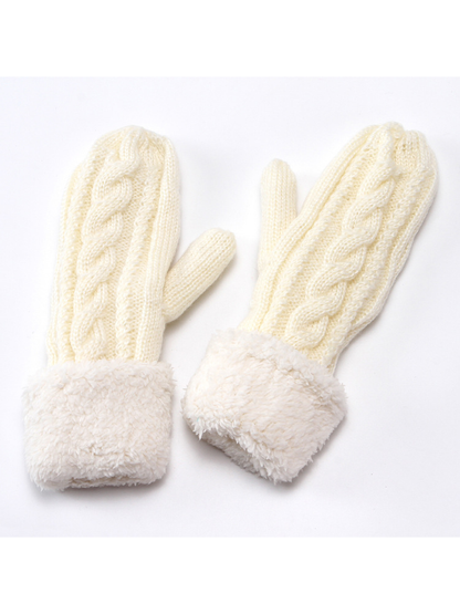 Ivory cable-knit mittens displayed together with matching plush cuffs