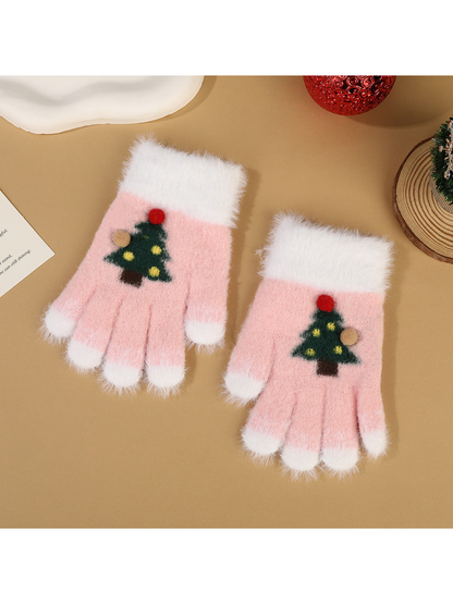 Light pink fuzzy fingerless gloves with white trim and Christmas tree motifs