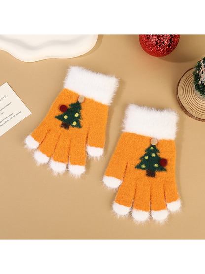 Orange fuzzy fingerless gloves with white trim and Christmas tree motifs