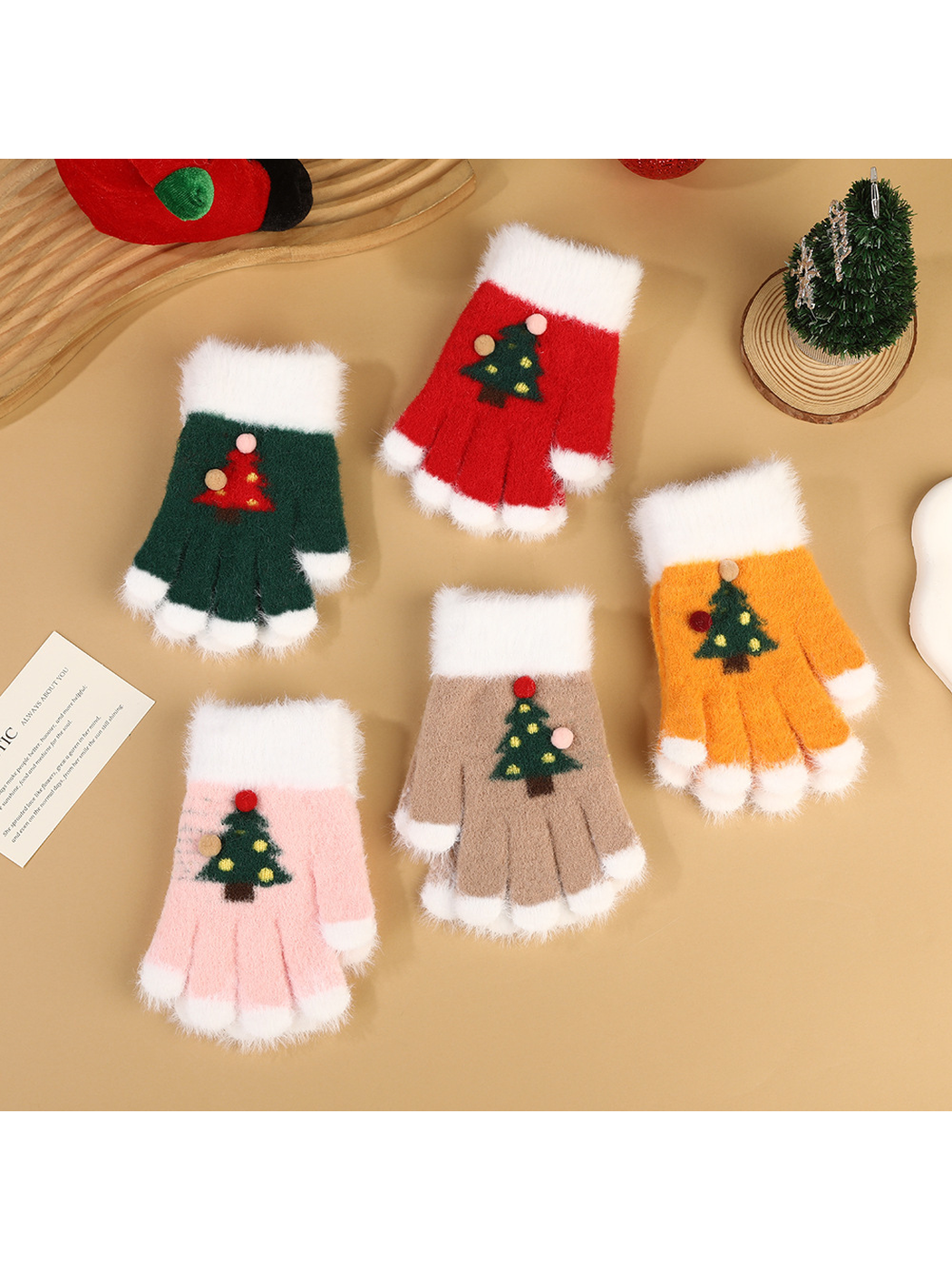 Five colors of fuzzy fingerless gloves displayed together
