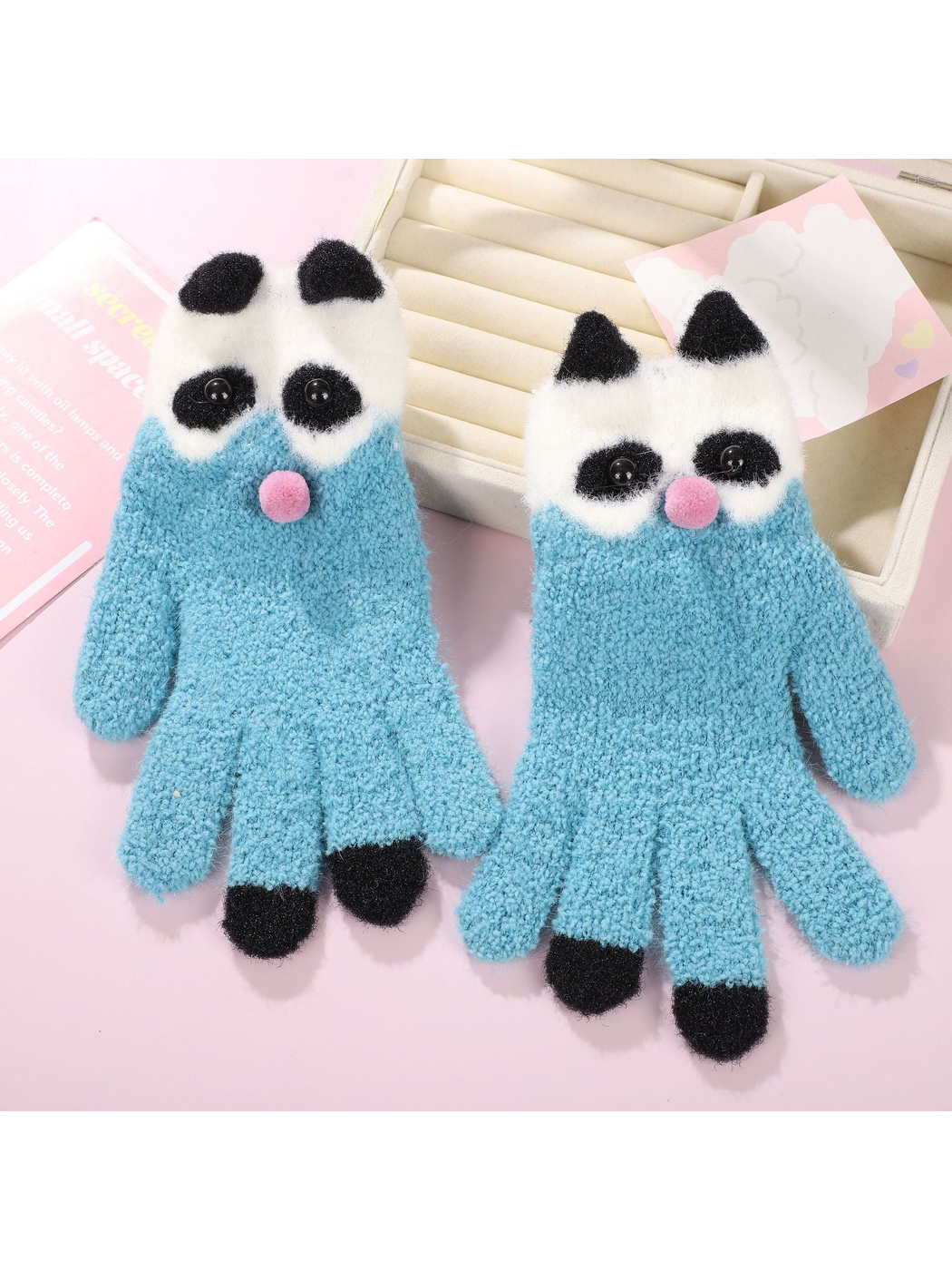 Light blue panda motif gloves with black fingertip accents