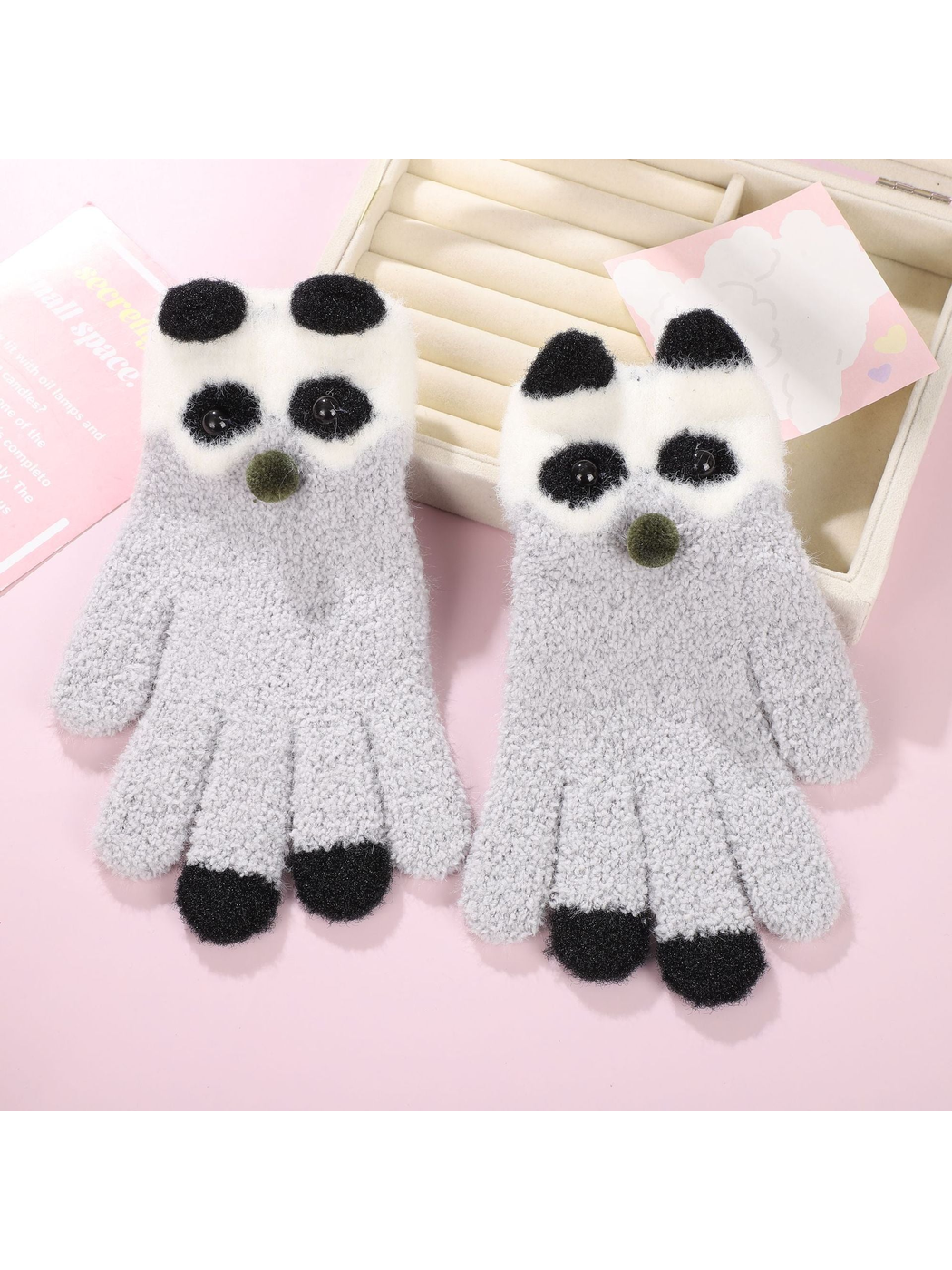 Light gray panda motif gloves with black fingertip accents