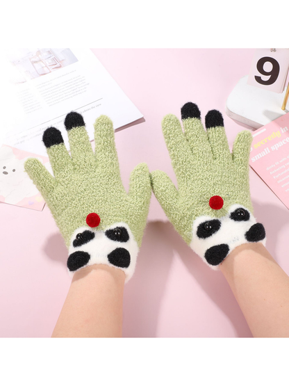 Light green panda motif gloves worn with the decorated cuffs visible