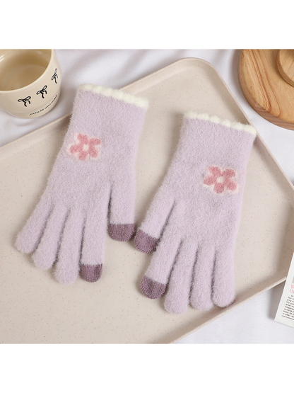 Light purple fuzzy gloves with pink flower motifs and purple fingertips