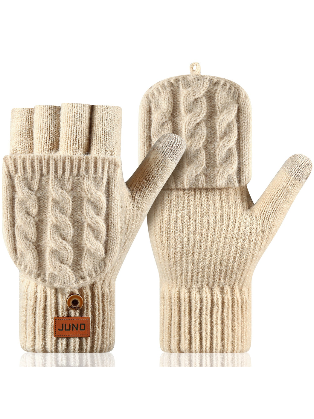 Cream convertible cable-knit gloves with one mitten flap folded back and one extended