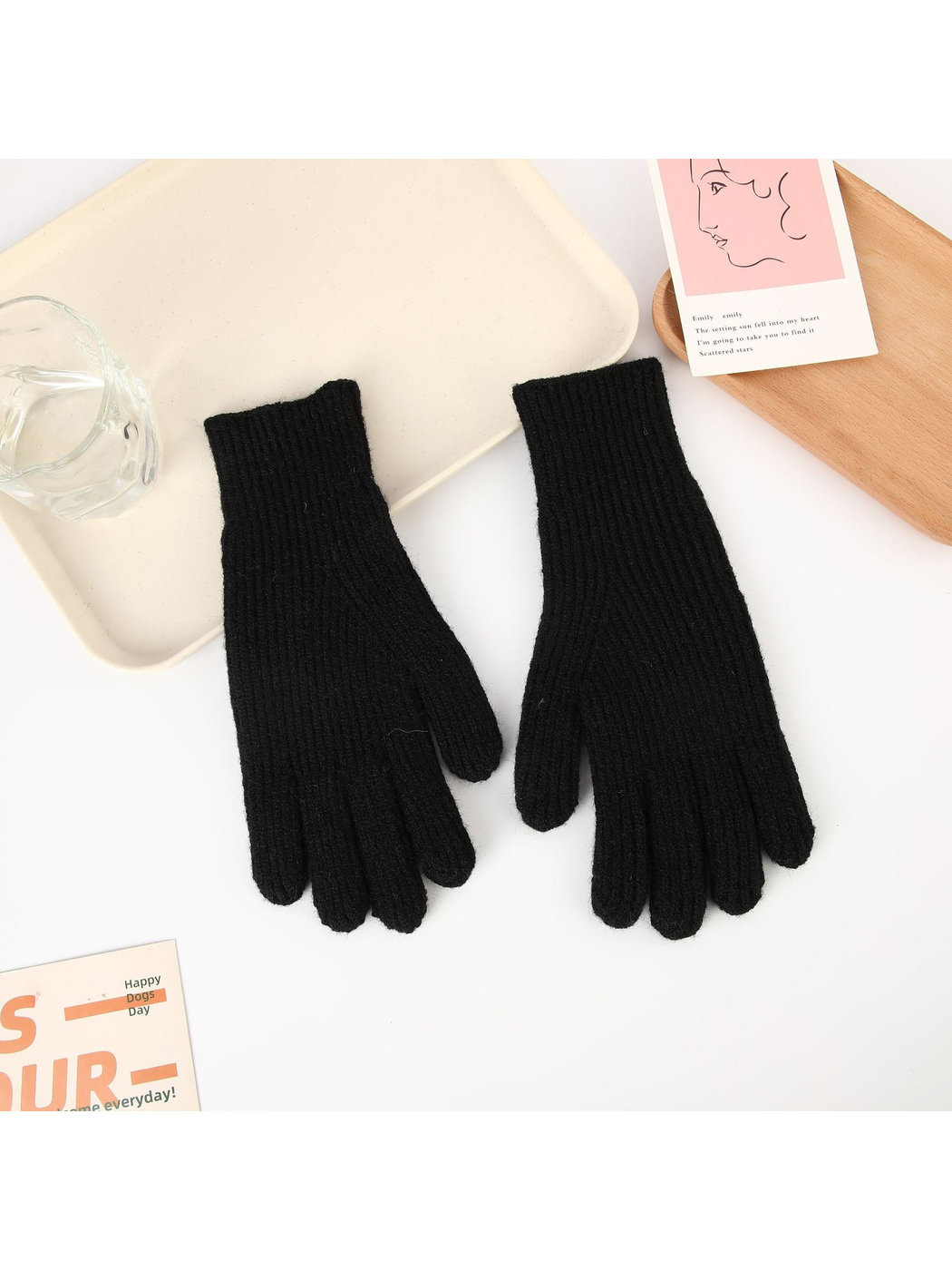 Black ribbed five-finger gloves, top view