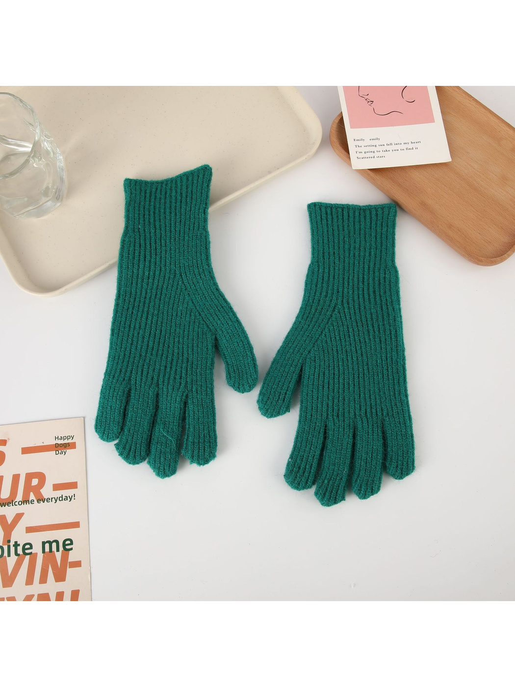 Green ribbed five-finger gloves, top view