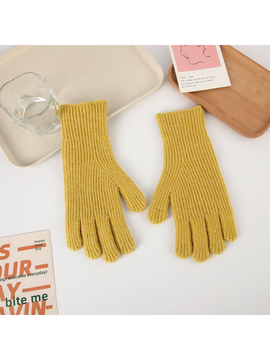 Mustard yellow ribbed five-finger gloves, top view