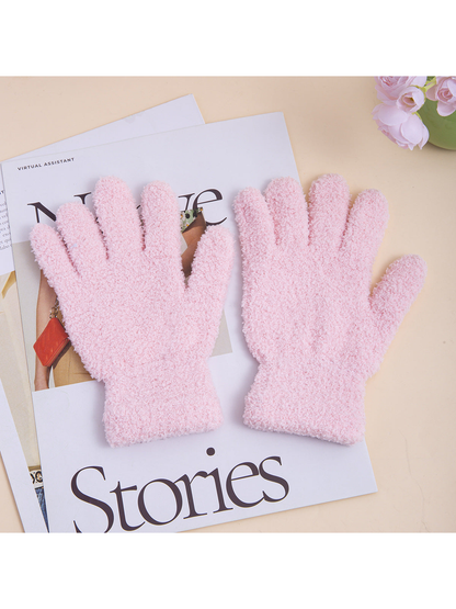 Pair of light pink fuzzy five-finger gloves with extended cuffs