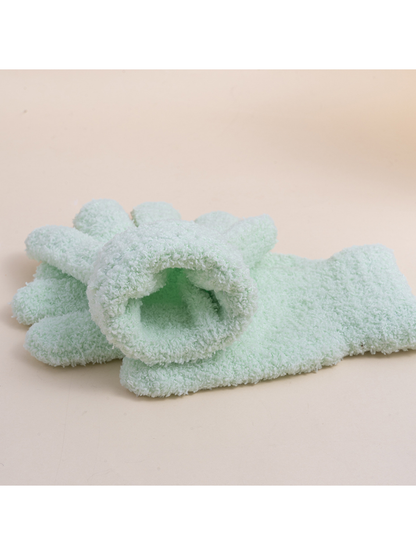 Close-up of the mint glove cuff opening and fuzzy texture
