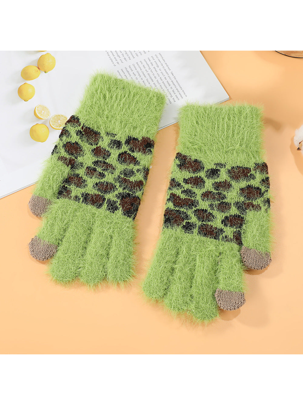 Green fuzzy gloves with brown and black leopard-pattern panels