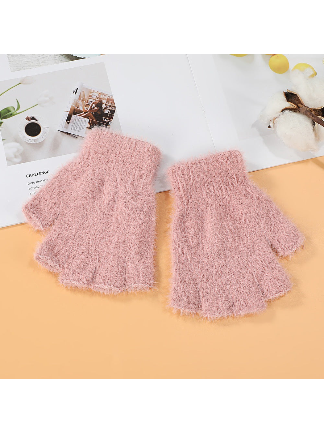 Dusty pink fuzzy fingerless gloves, top view