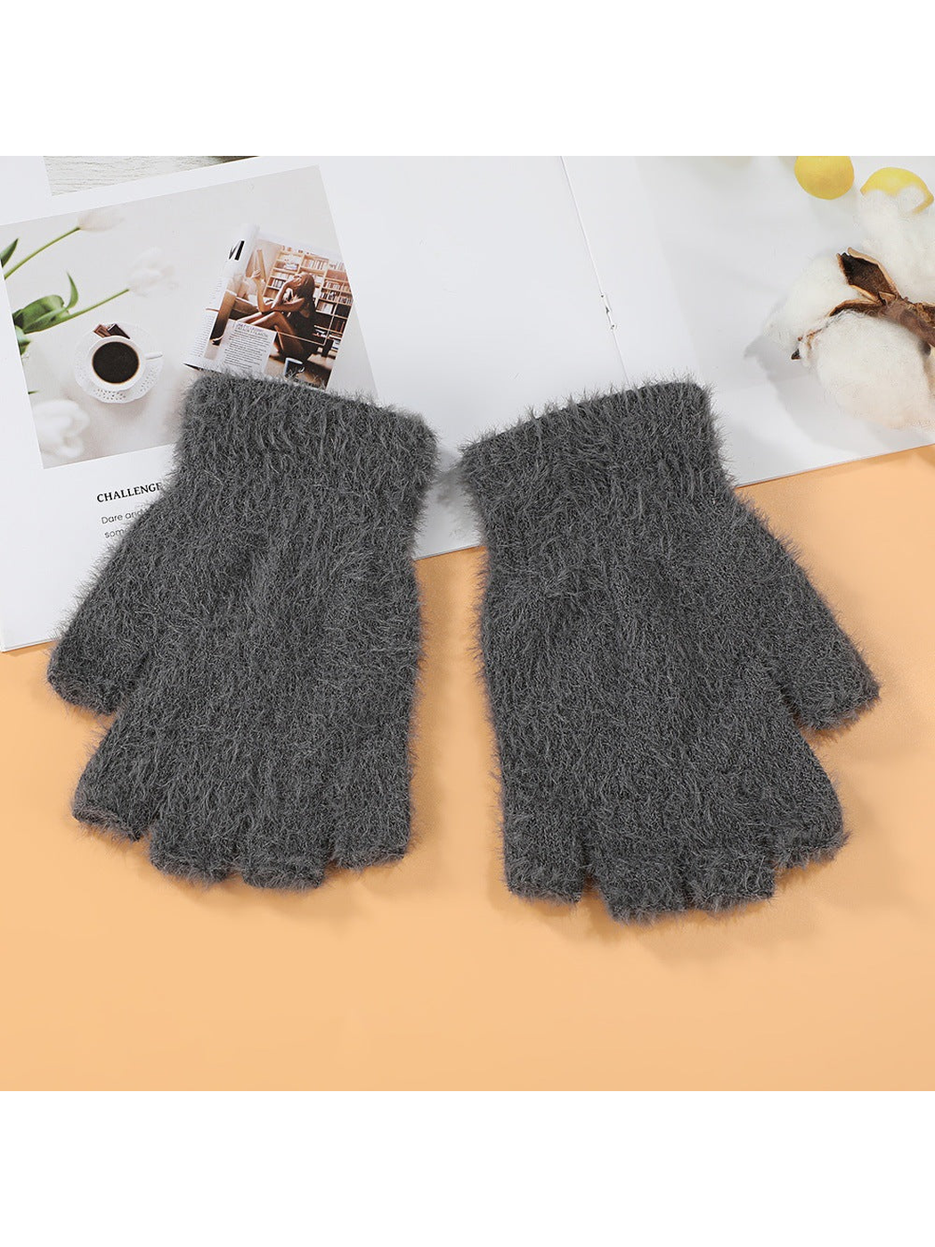 Dark gray fuzzy fingerless gloves, top view