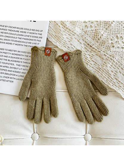 Muted green ribbed gloves with brown cuff logo patches
