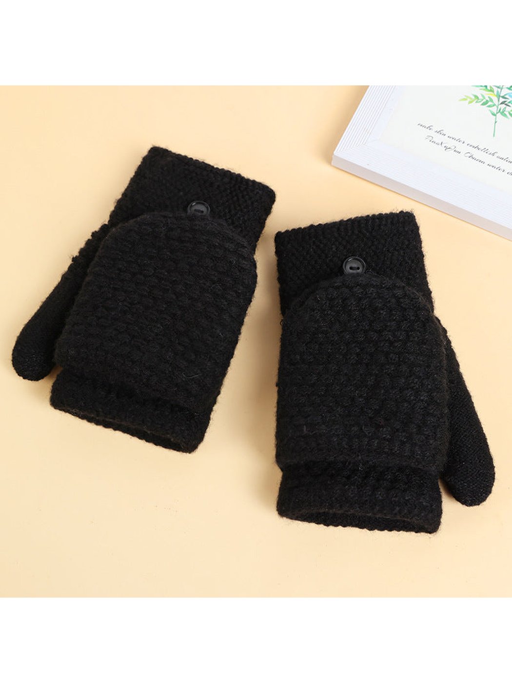 Black convertible mittens with raised textured finger covers