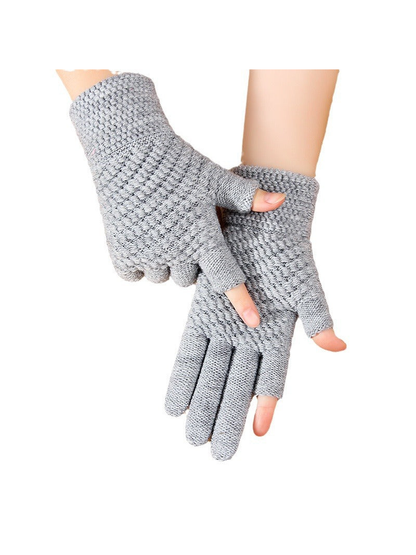 Gray open-fingertip gloves worn on both hands