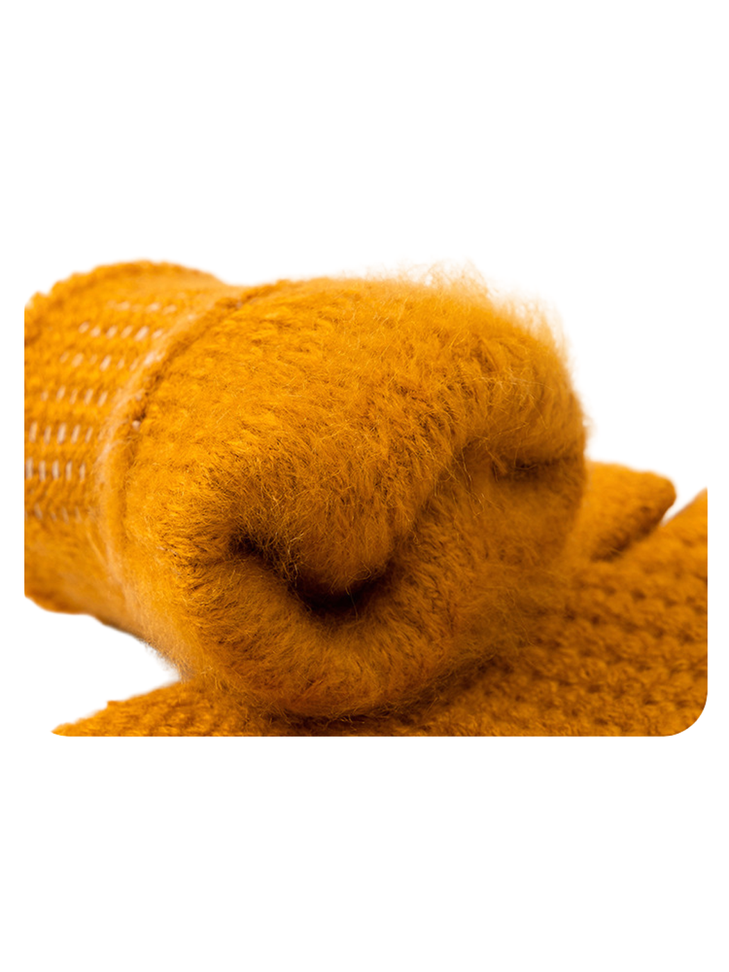 Close-up of the fuzzy interior and knit edge of a mustard glove