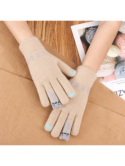 Beige cat motif gloves with pale blue fingertip accents