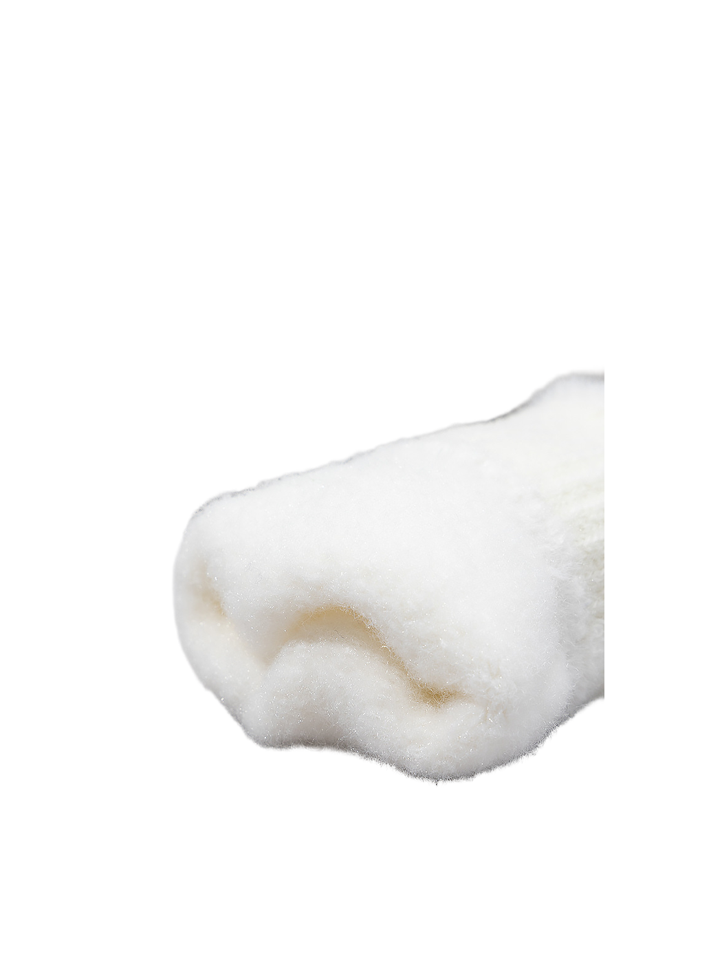 Close-up of the fuzzy interior at the white glove cuff opening