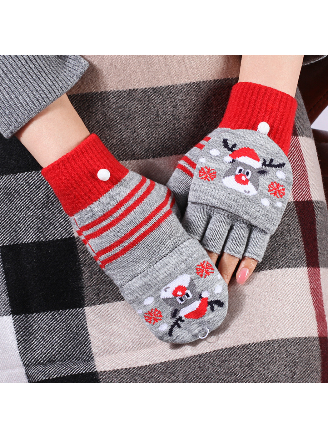 Gray and red reindeer gloves shown with one mitten cover closed and one folded back