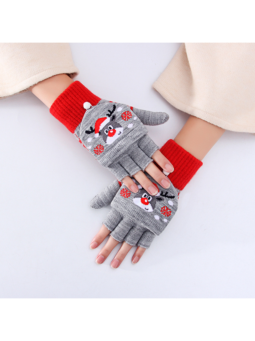 Gray and red reindeer convertible gloves worn against a light background