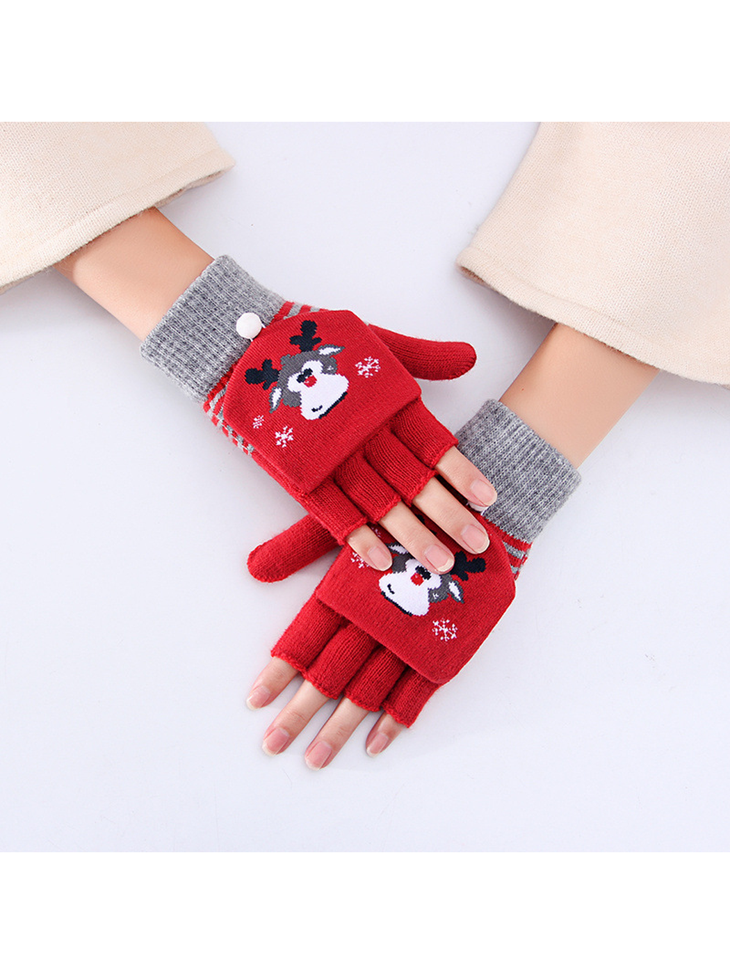 Red and gray reindeer convertible fingerless gloves worn with mitten covers folded back