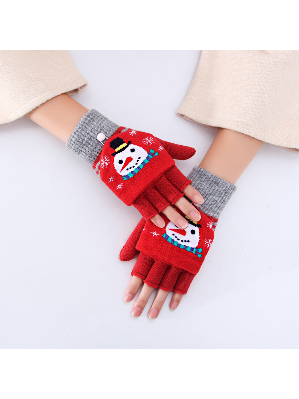 Red snowman convertible fingerless gloves worn with mitten covers folded back