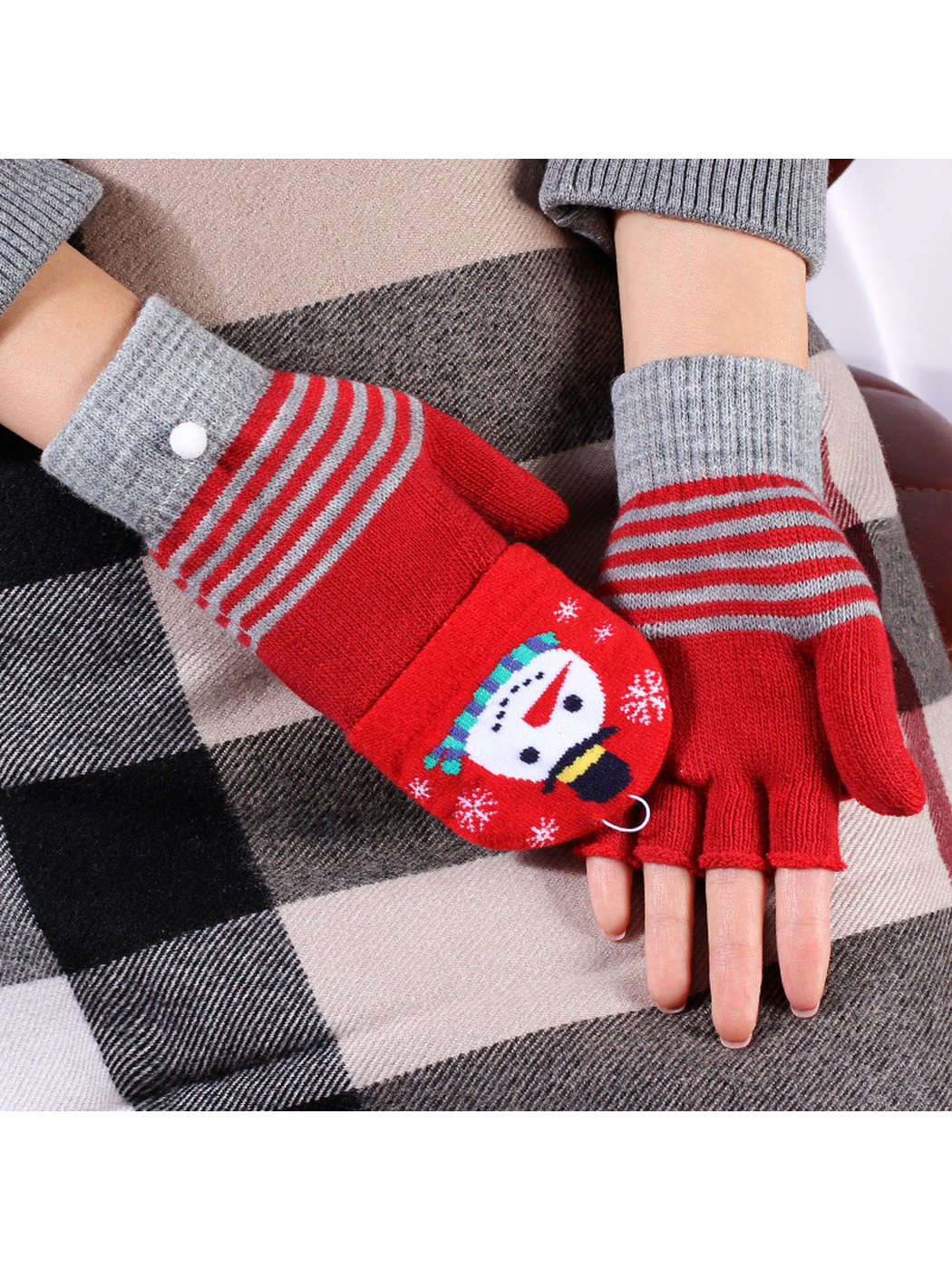 Red snowman gloves shown with one mitten cover closed and one folded back
