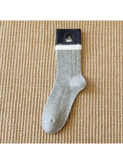 Heather gray crew sock with dark embroidered cuff and fuzzy trim