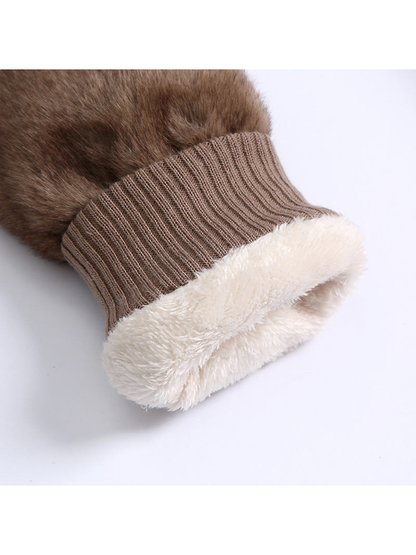 Close-up of a ribbed mitten cuff and contrasting fuzzy interior
