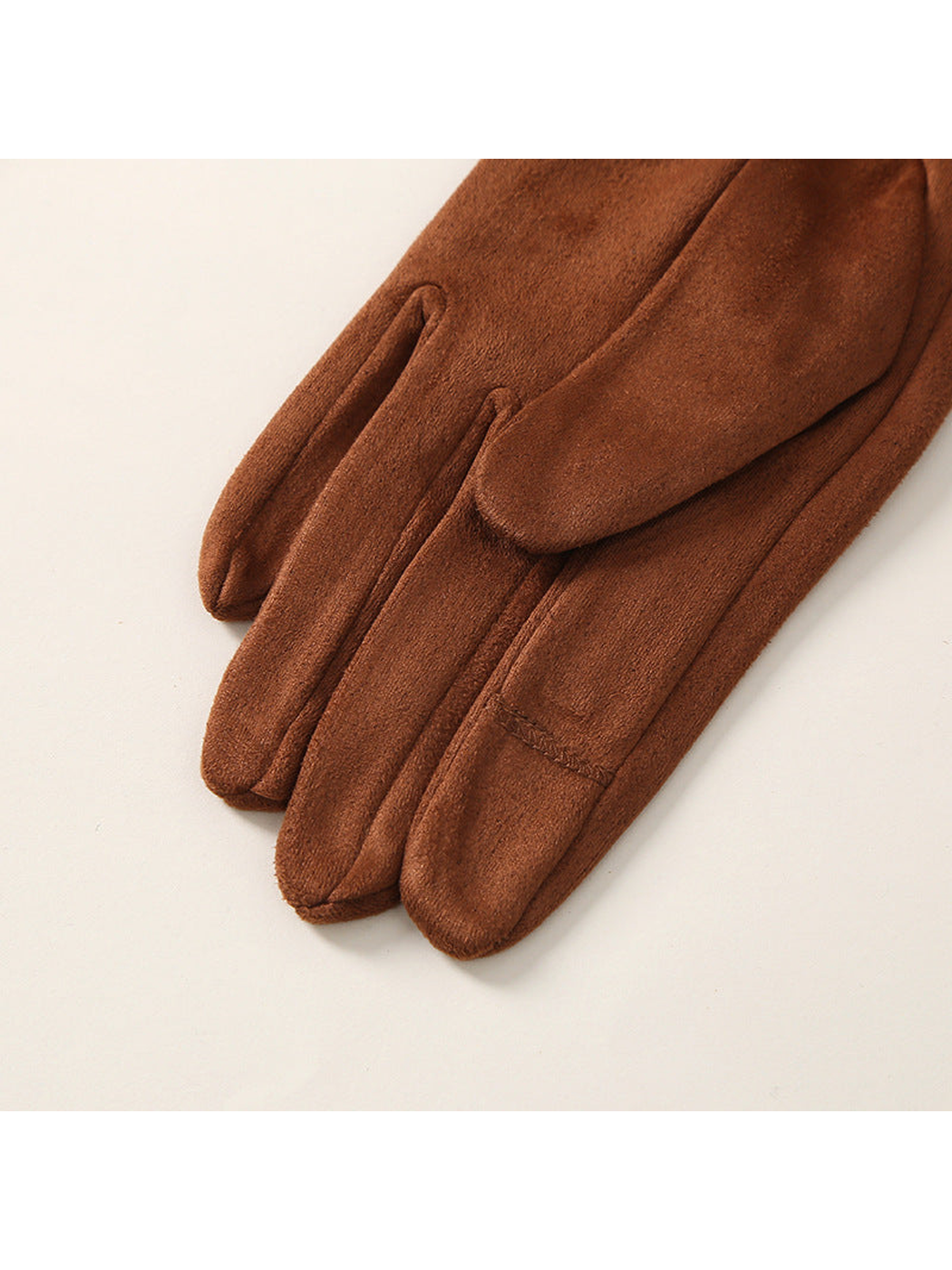 Close-up of brown gloves with brushed-look texture and fingertip panel