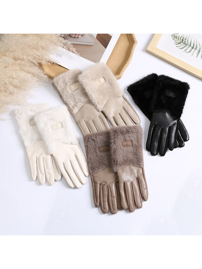 Black, white, beige and brown gloves displayed together