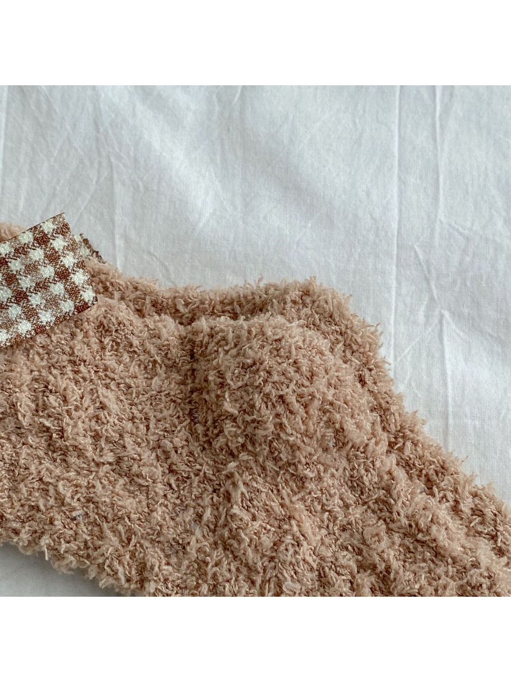 Close-up of the dense fuzzy looped sock texture