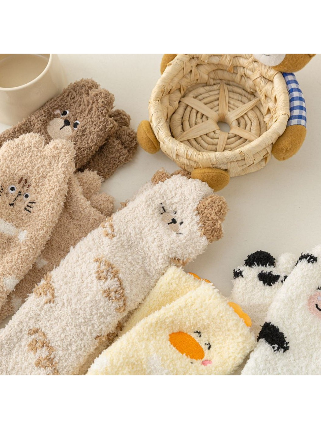 Close-up of fuzzy animal faces and raised cuff accents