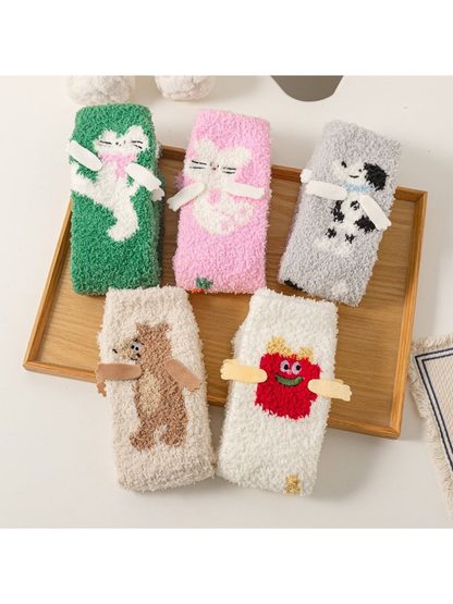 Five fuzzy crew sock styles with cat, dog, bear and character motifs