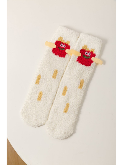 White fuzzy crew socks with a red character and projecting fabric arms