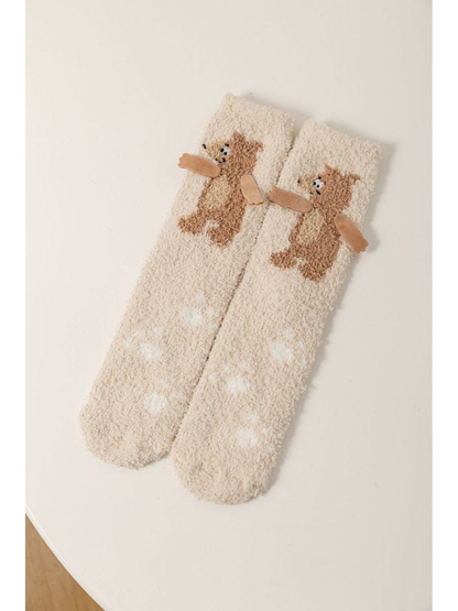 Beige fuzzy crew socks with a brown bear motif and white dots