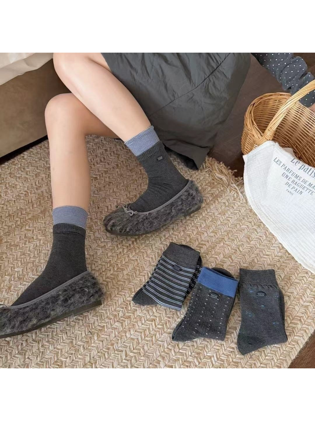 Dark gray crew socks styled with fuzzy gray flats alongside three additional patterns