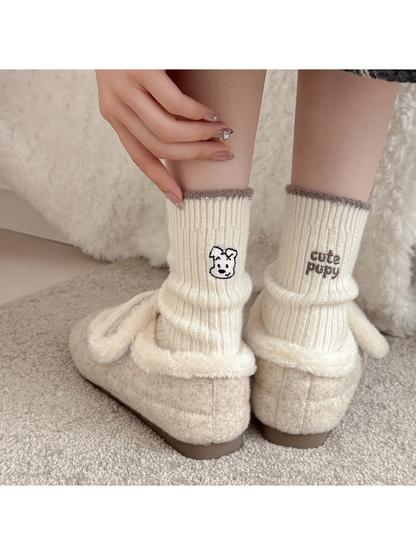 Brown contrast-trim crew socks with puppy motifs worn with plush shoes
