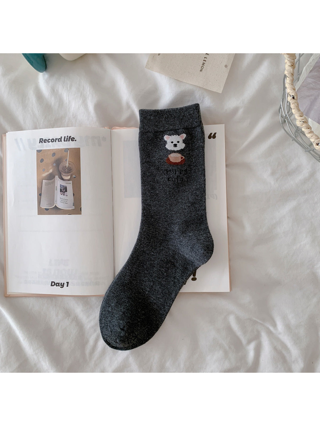 Dark gray crew sock with white dog and coffee cup motif