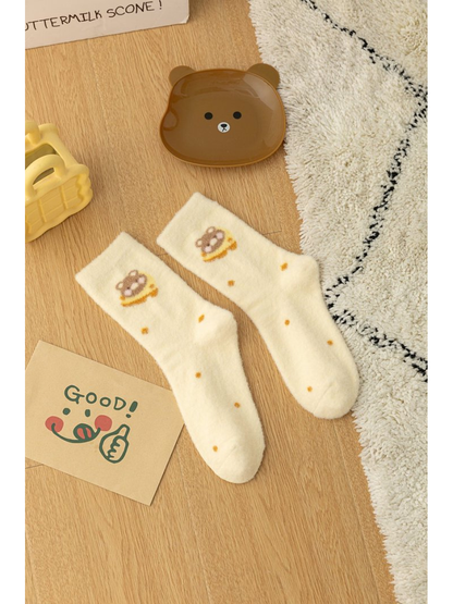 Ivory crew socks with bear faces and small dot motifs