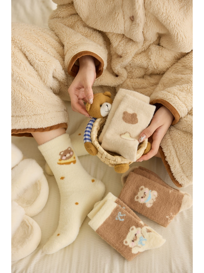 Cream and khaki patterned crew socks displayed in a bedroom scene