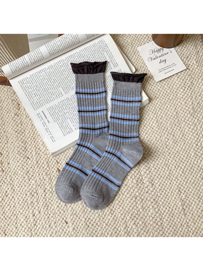 Gray ribbed crew socks with light blue and dark brown stripes